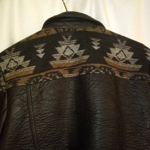 Black embossed leather like woman Jacket.